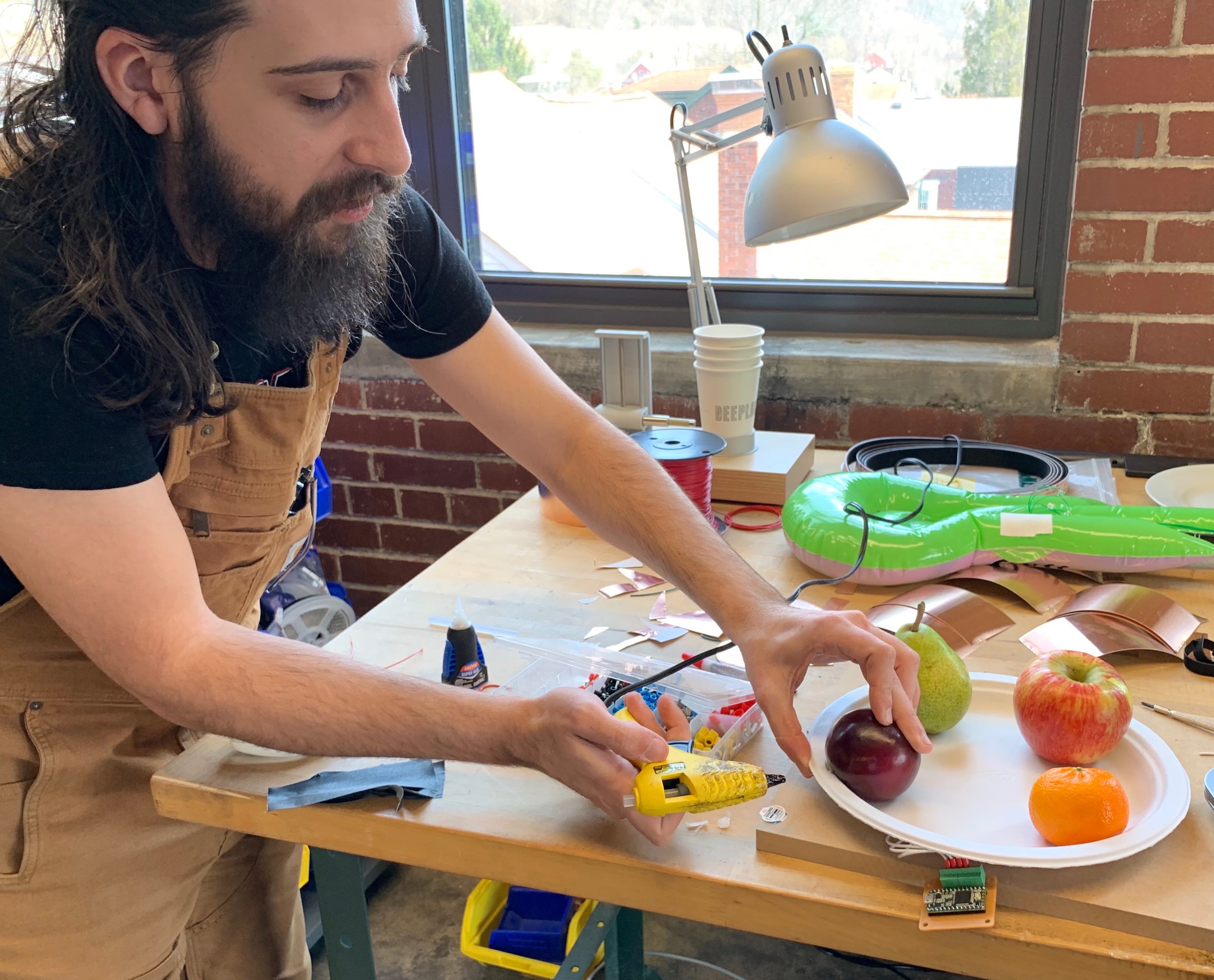 Nico Paris (Deeplocal) builds the original bowl of fruit.